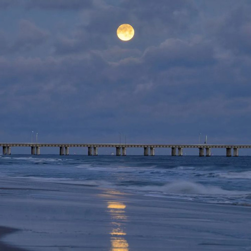 Winter moon over the bridge